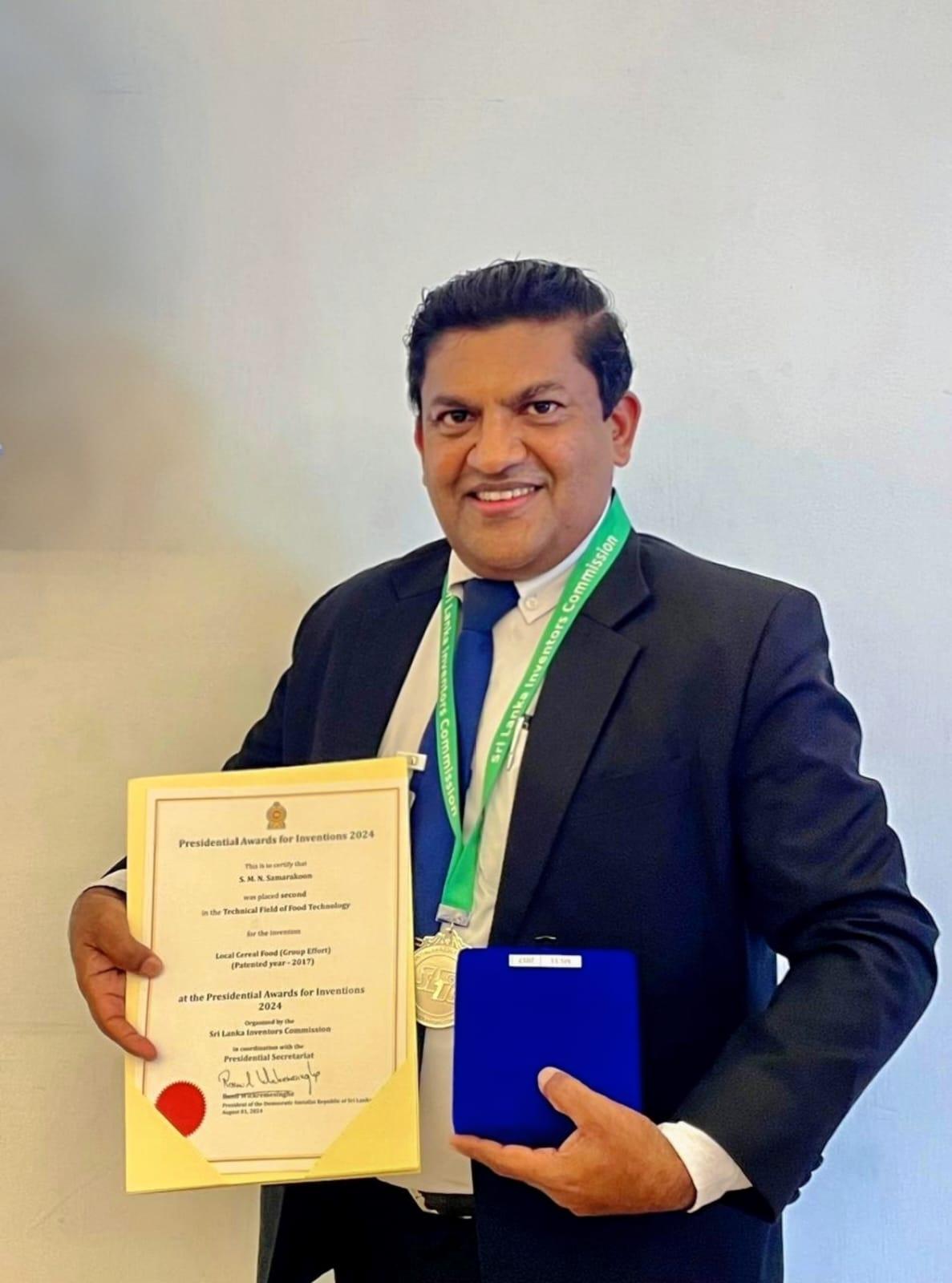 Director receiving an award